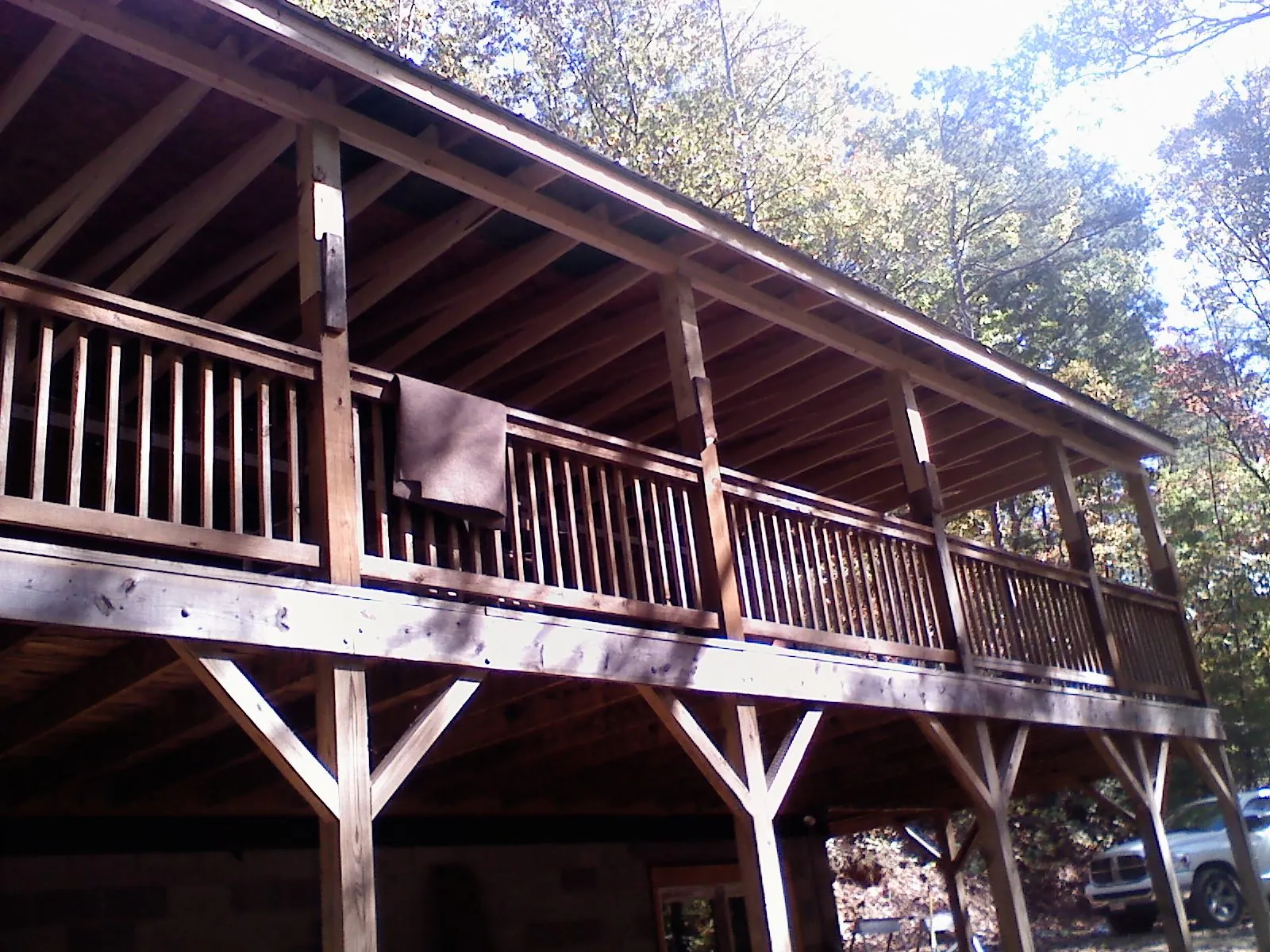 Timber framing under a new elevated porch and deck — Roof Leak Repair in Carlsbad by Roofing Brothers